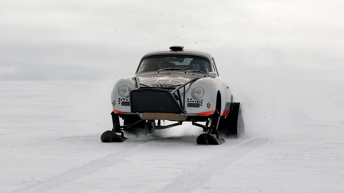 The Porsche was modified with skis and tracks.