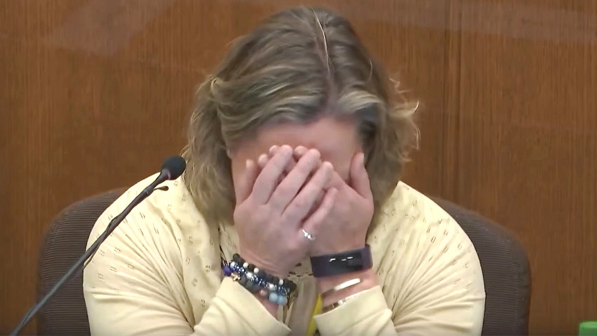 In this screen grab from video, former Brooklyn Center Police Officer Kim Potter becomes emotional as she testifies in court, Friday, Dec. 17, 2021. (Court TV, via AP, Pool) 