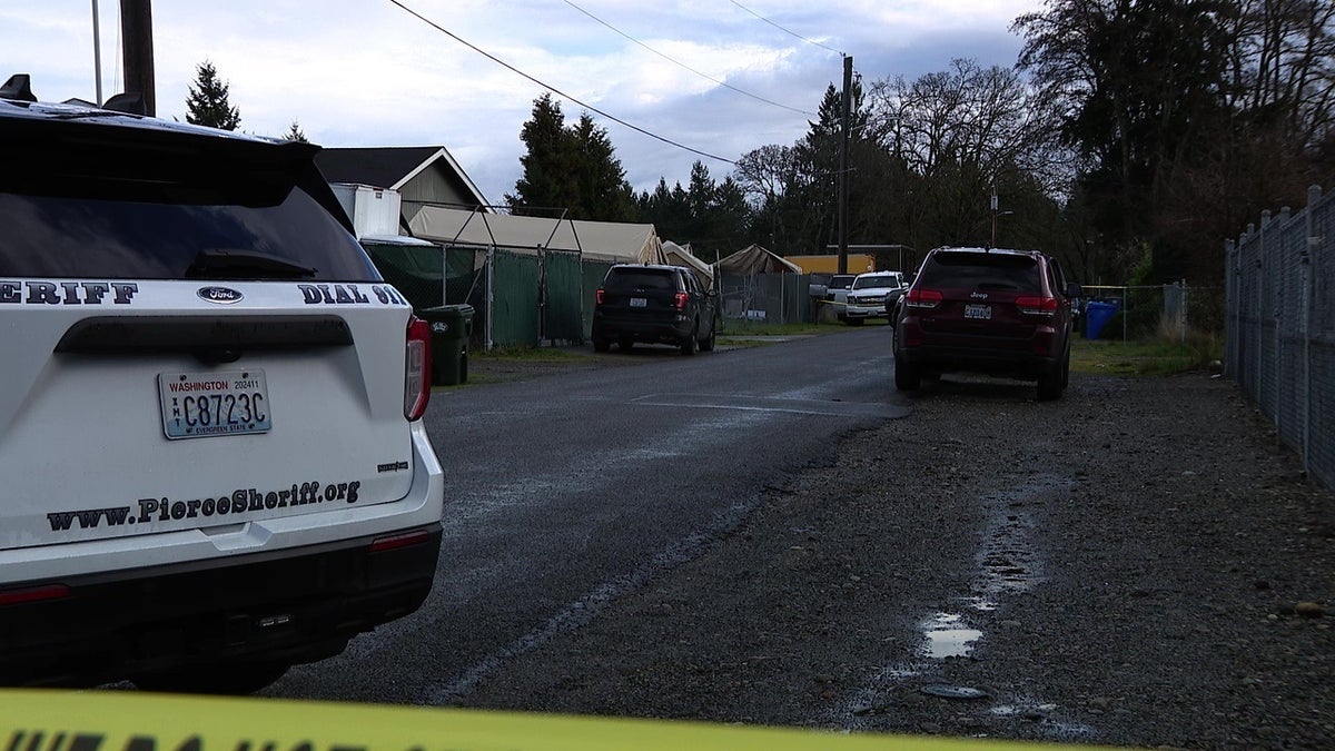 Washington authorities are searching for a second suspected intruder during a deadline home invasion where another suspect was killed. 