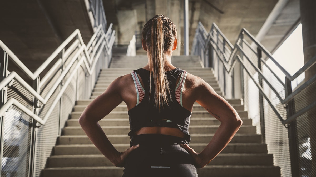 a woman in workout clothes