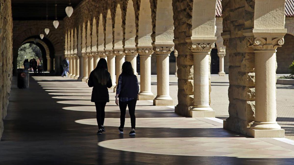 Students walk on the Stanford University 