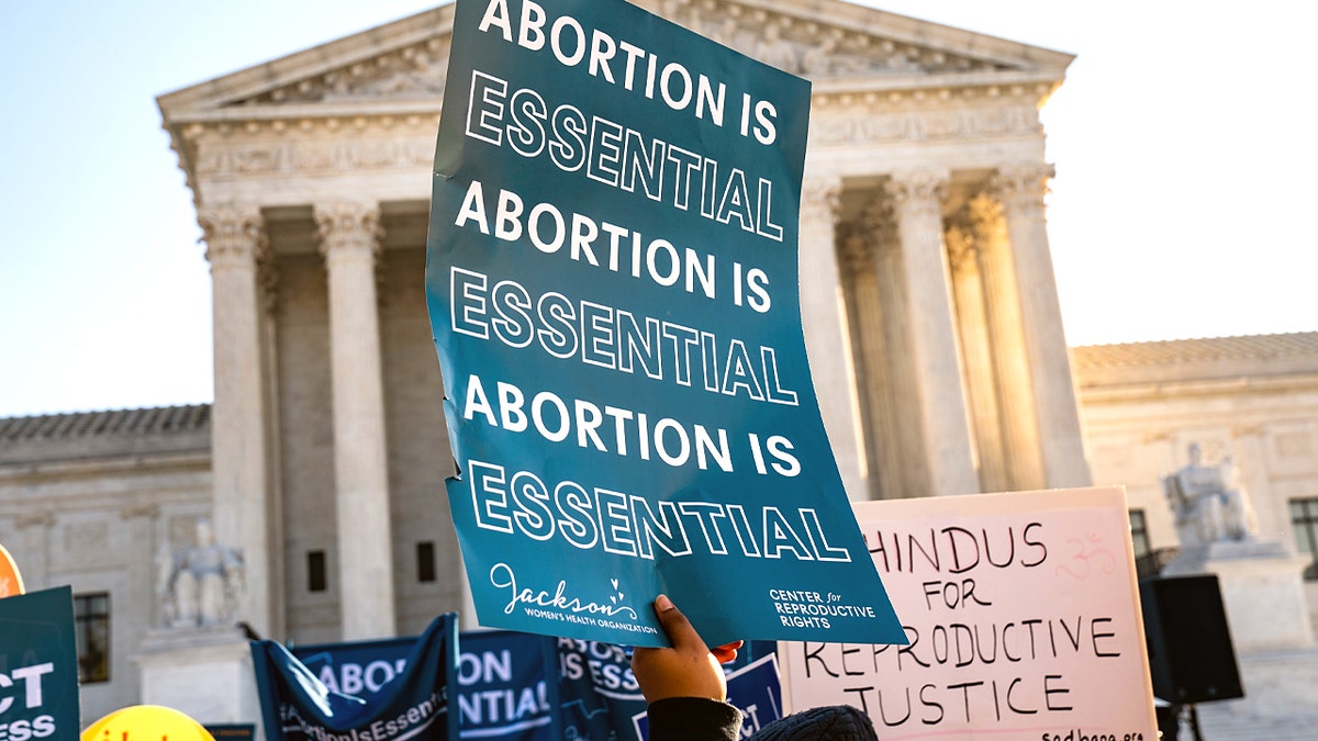 Abortion rights advocates and anti-abortion protesters demonstrate in front of the United States Supreme Court on Wednesday, Dec. 1, 2021, in Washington, D.C.