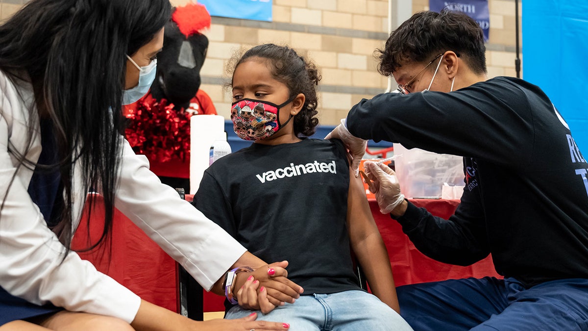 Sahana Malhorta, 7, is one of the first 5-7 year-olds to be vaccinated against COVID-19 at the LAUSD vaccination site located at Arleta High School in Arleta, CA (Photo by David Crane/MediaNews Group/Los Angeles Daily News via Getty Images)