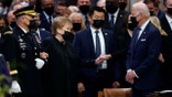 President Biden greets Sen. Elizabeth Dole, accompanied by Chairman of the Joint Chiefs Mark Milley, left, as she arrives at the funeral for her husband, former Sen. Bob Dole of Kansas, at the Washington National Cathedral, Friday, Dec. 10, 2021, in Washington. (AP Photo/Jacquelyn Martin)