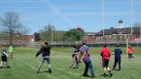 Kids playing outside a school 6th Graders Playing Game During Recess, Wellsville, New York