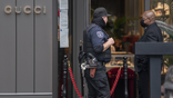 A security guard outside a Gucci store in San Francisco, California as retail theft increases across the United States.