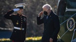WASHINGTON, DC - DECEMBER 20: U.S. President Joe Biden salutes as he exits Marine One on the South Lawn of the White House December 20, 2021 in Washington, DC. Biden spent the weekend in Wilmington, Delaware. (Photo by Drew Angerer/Getty Images)
