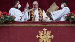 Pope Francis delivers the Urbi et Orbi (Latin for ‘to the city and to the world’ ) Christmas’ day blessing from the main balcony of St. Peter’s Basilica at the Vatican, Saturday, Dec. 25, 2021. (AP Photo/Gregorio Borgia)