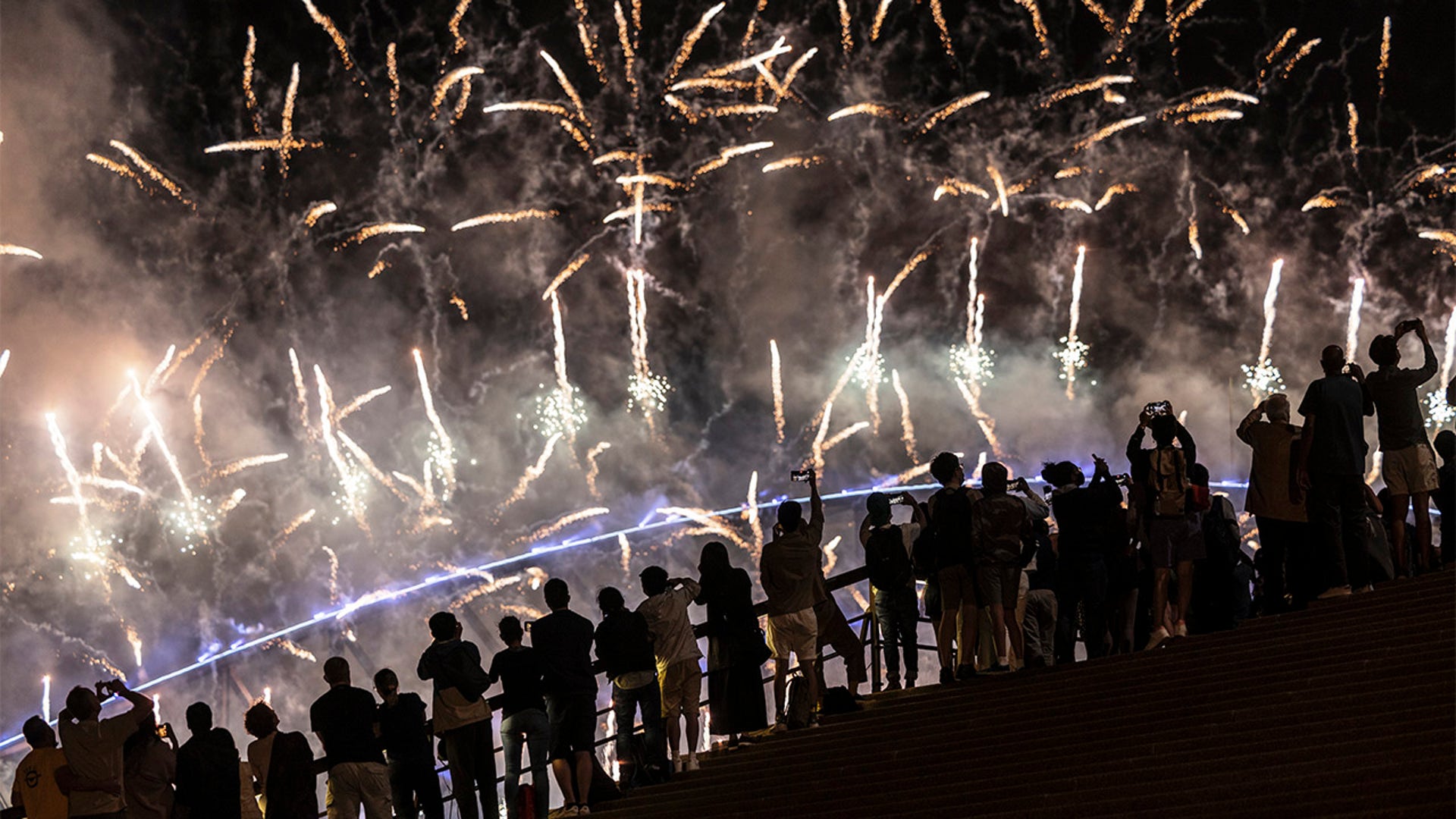 Fireworks light up the sky over Sydney Harbour as the clock strikes midnight on January 01, 2022 in Sydney, Australia.