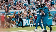 Jaguars fan arrested after running into the end zone as James Robinson scores a touchdown