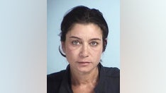 Ex-Playboy model and 'Baywatch' 'Karen' faces assault charge in spat with foul-mouthed old man on Delta flight