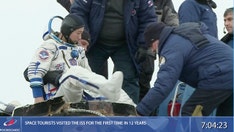 Japan’s space tourists return to Earth after 12-day visit