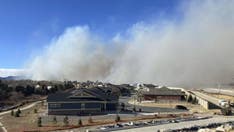 Colorado wildfires send residents scrambling for cover, force two towns to evacuate