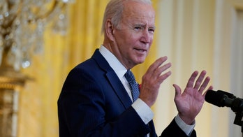 Biden on World AIDS Day declares racism a ‘public health threat’