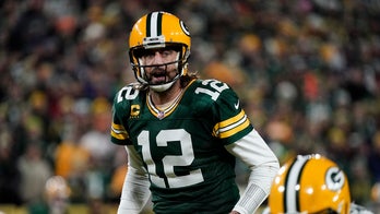 Rodgers throws 4 TD passes, Packers defeat Bears 45-30