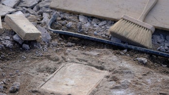 Crews may have found 1887 time capsule in Lee statue base