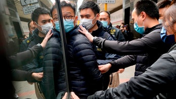 Hong Kong court denies bail to pro-democracy editors charged with sedition