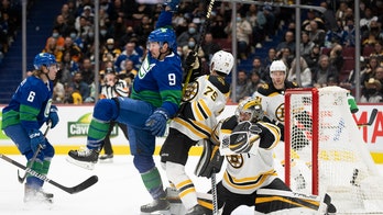 Canucks beat Bruins 2-1 in SO, Boudreau improves to 2-0
