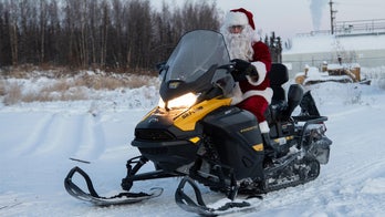 Marines help Santa deliver Christmas presents in Alaska