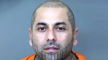 Machete-wielding man arrested in string of Arizona cell phone store robberies