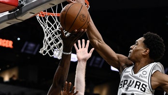 Spurs topple Nuggets 123-111, snapping two-game skid