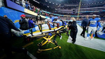 Chargers' Donald Parham Jr taken off field in stretcher after appearing to hit head on ground