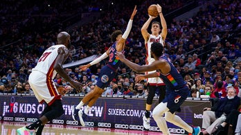 Vincent, Robinson lead short-handed Heat past 76ers 101-96