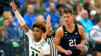 Utah Valley pulls away in OT, stuns No. 12 BYU 72-65