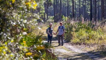 Brian Laundrie's parents seen hiking in Myakkahatchee Creek park following son's death