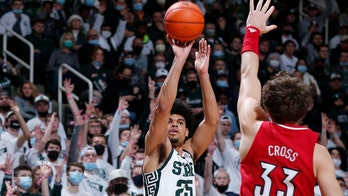 Malik Hall helps No. 22 Michigan State beat Louisville 73-64