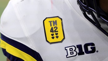 Michigan scores 42 points in Big Ten title game as they honor Oxford High School shooting victims