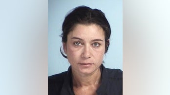 Ex-Playboy model and 'Baywatch' 'Karen' faces assault charge in spat with foul-mouthed old man on Delta flight