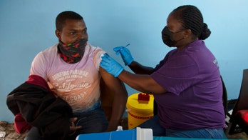 As omicron cases surge, South Africa excess deaths nearly double: report