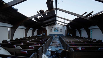 Two Kentucky congregations hold joint service in lot between destroyed churches