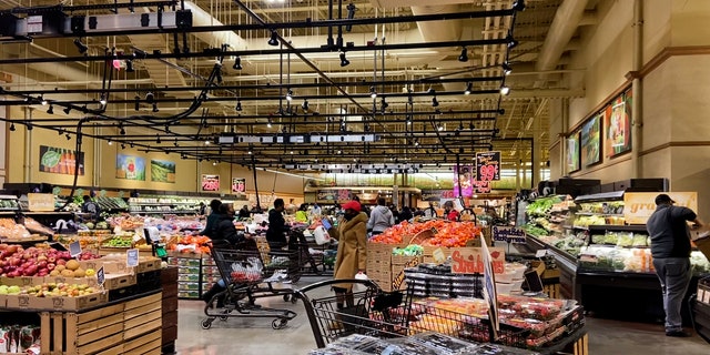 Grocery store shoppers in a Washington, D.C., suburb