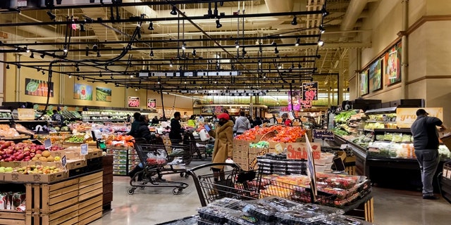 Grocery store shoppers in a Washington, D.C., suburb