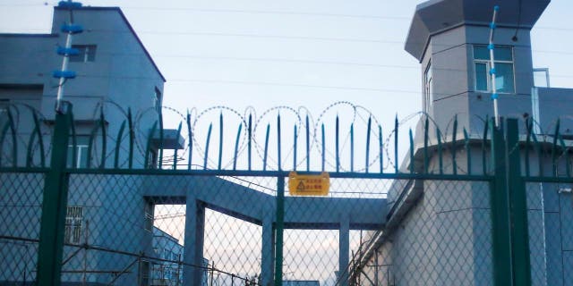 A perimeter fence is constructed around what is officially known as a vocational skills education center in Dabancheng in Xinjiang Uyghur Autonomous Region, China Sept. 4, 2018.