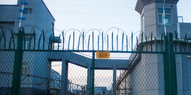 A perimeter fence is constructed around what is officially known as a vocational skills education centre in Dabancheng in Xinjiang Uighur Autonomous Region, China September 4, 2018. This centre, situated between regional capital Urumqi and tourist spot Turpan, is among the largest known ones, and was still undergoing extensive construction and expansion at the time the photo was taken. Police in Dabancheng detained two Reuters journalists for more than four hours after the photos were taken. Picture taken September 4, 2018. To match Special Report MUSLIMS-CAMPS/CHINA REUTERS/Thomas Peter