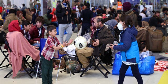 Children that were evacuated from Afghanistan play at the U.S. airbase in Ramstein, Germany, August 28, 2021.