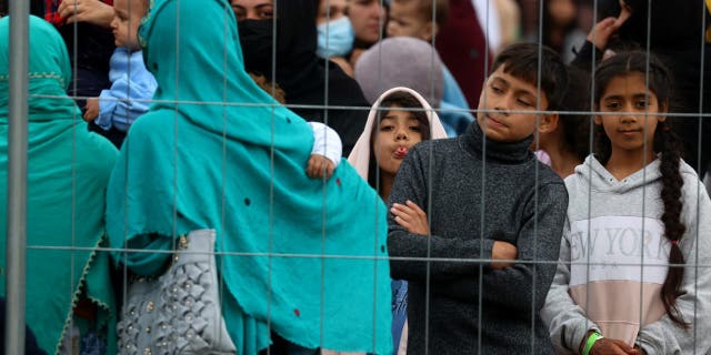 Evacuees from Afghanistan are seen at their temporary shelter inside the U.S. Army Rhine Ordonanz Barracks in Kaiserslautern, Germany, August 30, 2021.