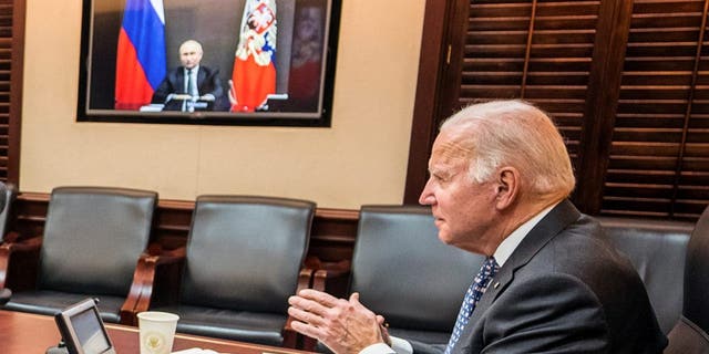 U.S. President Joe Biden holds virtual talks with Russia's President Vladimir Putin amid Western fears that Moscow plans to attack Ukraine, during a secure video call from the Situation Room at the White House in Washington, U.S., December 7, 2021.