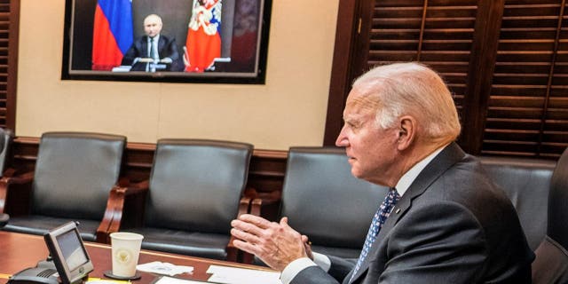 U.S. President Joe Biden holds virtual talks with Russia's President Vladimir Putin amid Western fears that Moscow plans to attack Ukraine, during a secure video call from the Situation Room at the White House in Washington, U.S., December 7, 2021.