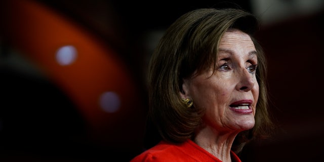 House Speaker Nancy Pelosi speaks to reporters during her weekly news conference on Capitol Hill Dec. 8, 2021. (REUTERS/Elizabeth Frantz)