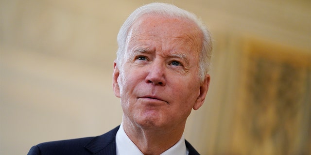 President Biden listens to a reporters question after delivering remarks on the November jobs report, in the State Dining Room of the White House, Friday, Dec. 3, 2021, in Washington. (AP Photo/Evan Vucci)