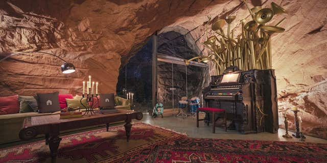 The residence is a 5,700 square foot "lair" that sits inside a hand-carved cave.