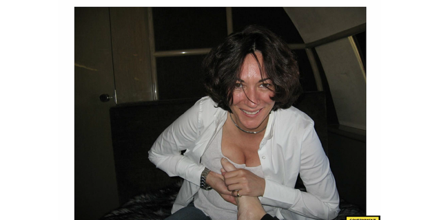Ghislaine Maxwell rubbing Jeffrey Epstein's feet on a private jet in an undated photo.