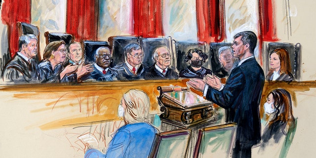 This artist sketch depicts Mississippi Solicitor General Scott Stewart standing while speaking to the Supreme Court, Wednesday, Dec. 1, 2021, in Washington, D.C.