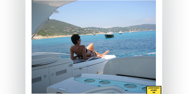 Ghislaine Maxwell sunbathing on a yacht