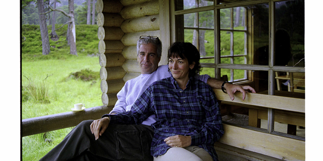 Jeffrey Epstein and Ghislaine Maxwell at a log cabin