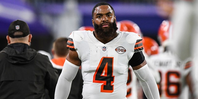 Cleveland Browns linebacker Anthony Walker Jr. looks on from the sideline during the first half of an NFL football game against the Baltimore Ravens, Nov. 28, 2021, in Baltimore. 